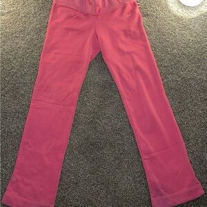 Woman’s NIKE pink flare track suit bottoms